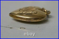 Antique 10K Yellow Gold Puffy Heart Locket / Charm with photos inside