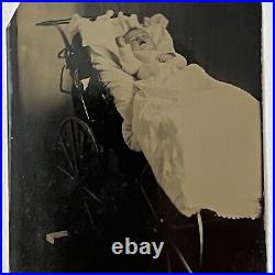 Antique Tintype Photograph Post Mortem Baby in Stroller Momento Mori Morbid Odd