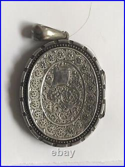 Antique Victorian Silver Oval Form Locket Pendant with picture