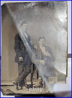 Antique tintype (a. K. A. Ferrotype) photo. Father and son photo