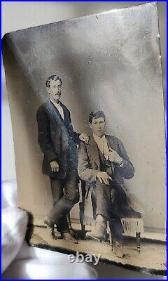 Antique tintype (a. K. A. Ferrotype) photo. Father and son photo