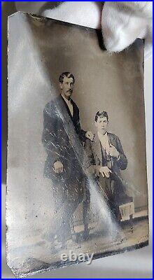 Antique tintype (a. K. A. Ferrotype) photo. Father and son photo