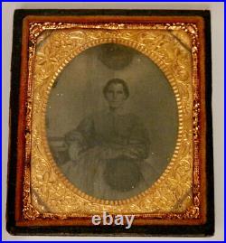 Antique vintage tintype photo of woman in ornate frame
