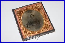 Antique vintage tintype photo of woman in ornate frame