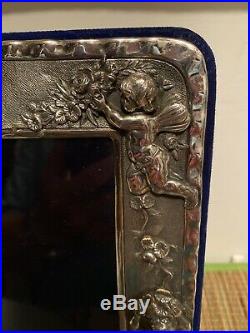 English Vintage High relief Cherub picture frame Sterling Silver. Holds 5x31/2